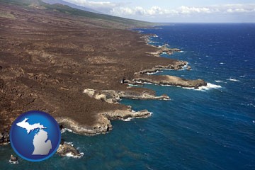 an aerial photograph of a Hawaiian shoreline - with Michigan icon