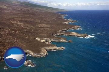 an aerial photograph of a Hawaiian shoreline - with North Carolina icon