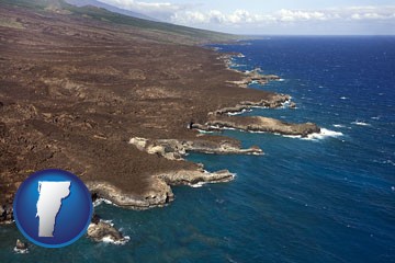 an aerial photograph of a Hawaiian shoreline - with Vermont icon