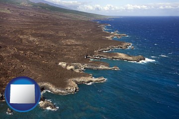an aerial photograph of a Hawaiian shoreline - with Wyoming icon